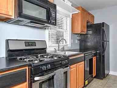 6954 Sutherland Ave, Saint Louis, MO 63109, USA - Photo 4 of 16
