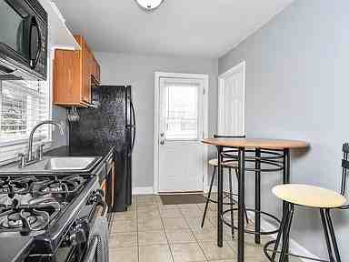 6954 Sutherland Ave, Saint Louis, MO 63109, USA - Photo 5 of 16