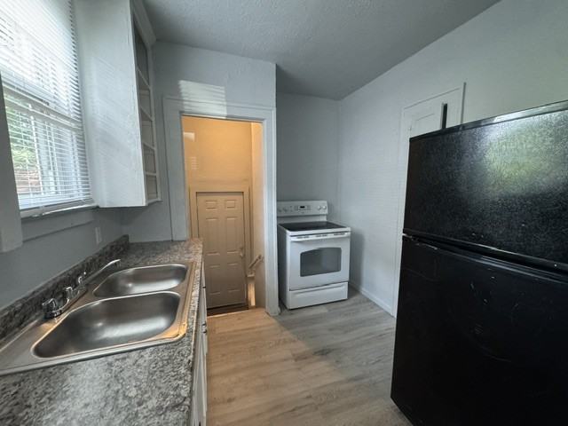 15766 Woodingham Dr #1 - Photo 5 of 13