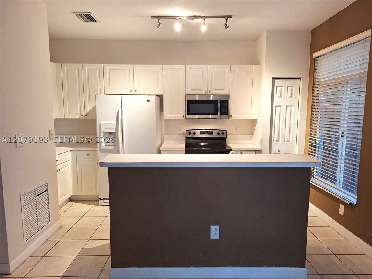 5770 Nw 113th Pl #0 - Photo 3 of 17
