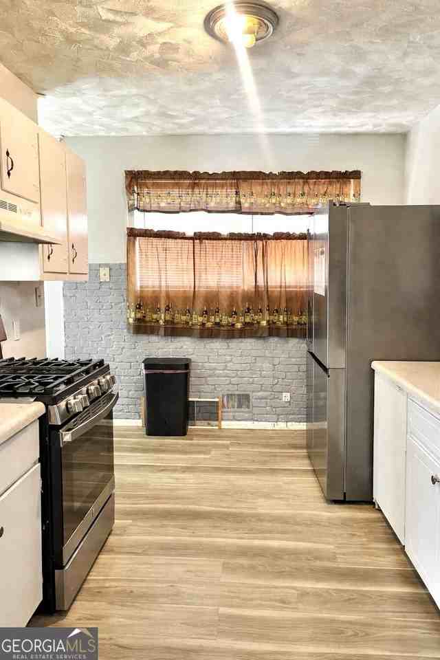 6973 Kimberland Gardens Ln - Photo 5 of 11