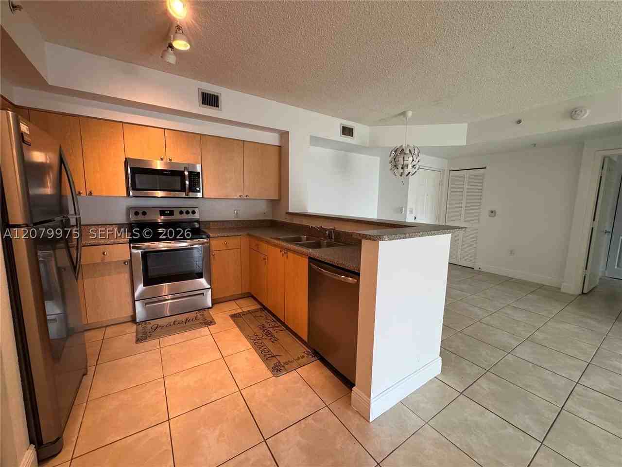 7920 N Nob Hill Rd #103 - Photo 3 of 14