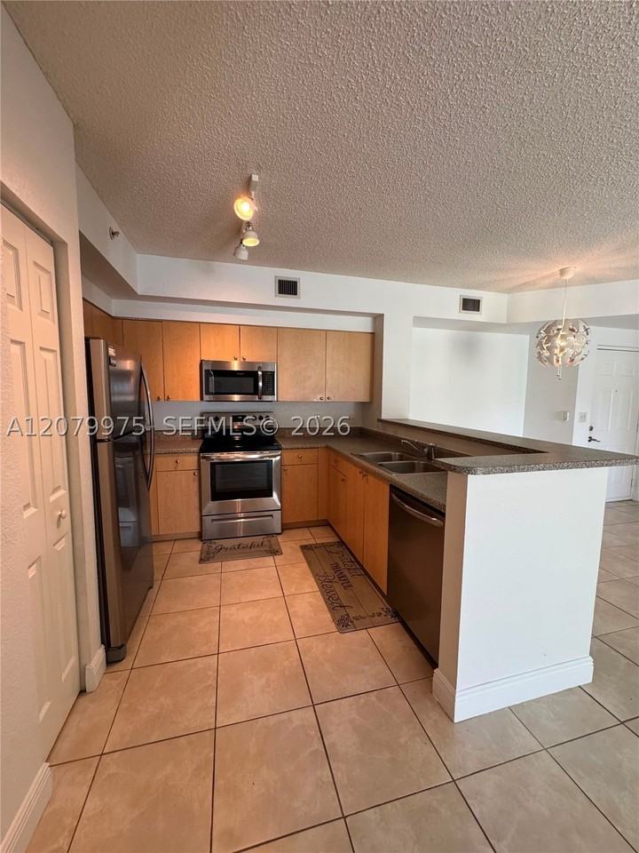7920 N Nob Hill Rd #103 - Photo 7 of 14