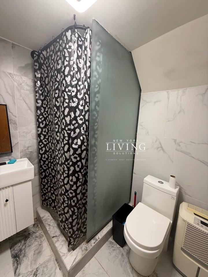 6818 Avenue L - Photo 3 of 8