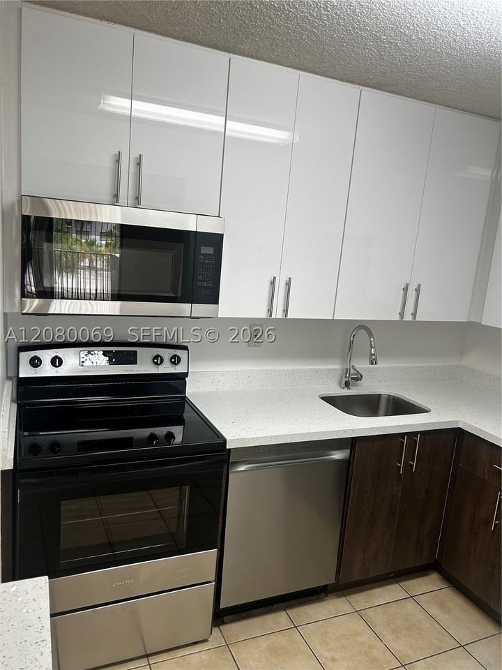 7180 Nw 179th St #211 - Photo 2 of 16