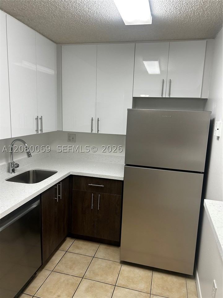 7180 Nw 179th St #211 - Photo 3 of 16