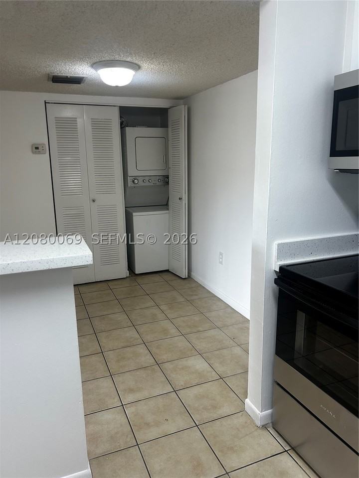 7180 Nw 179th St #211 - Photo 4 of 16