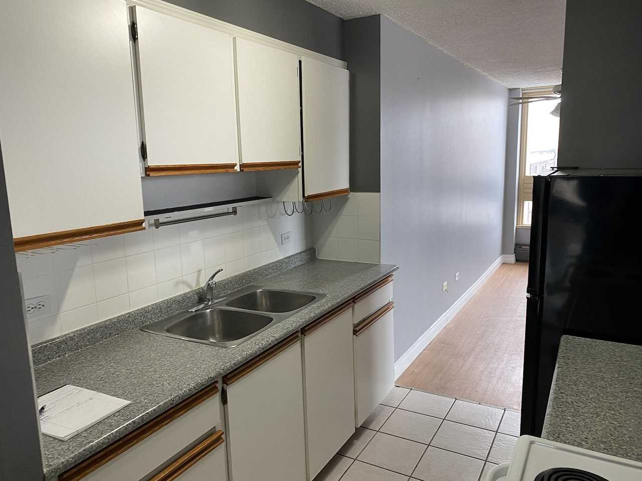 1133 17 Ave Nw - Photo 3 of 6