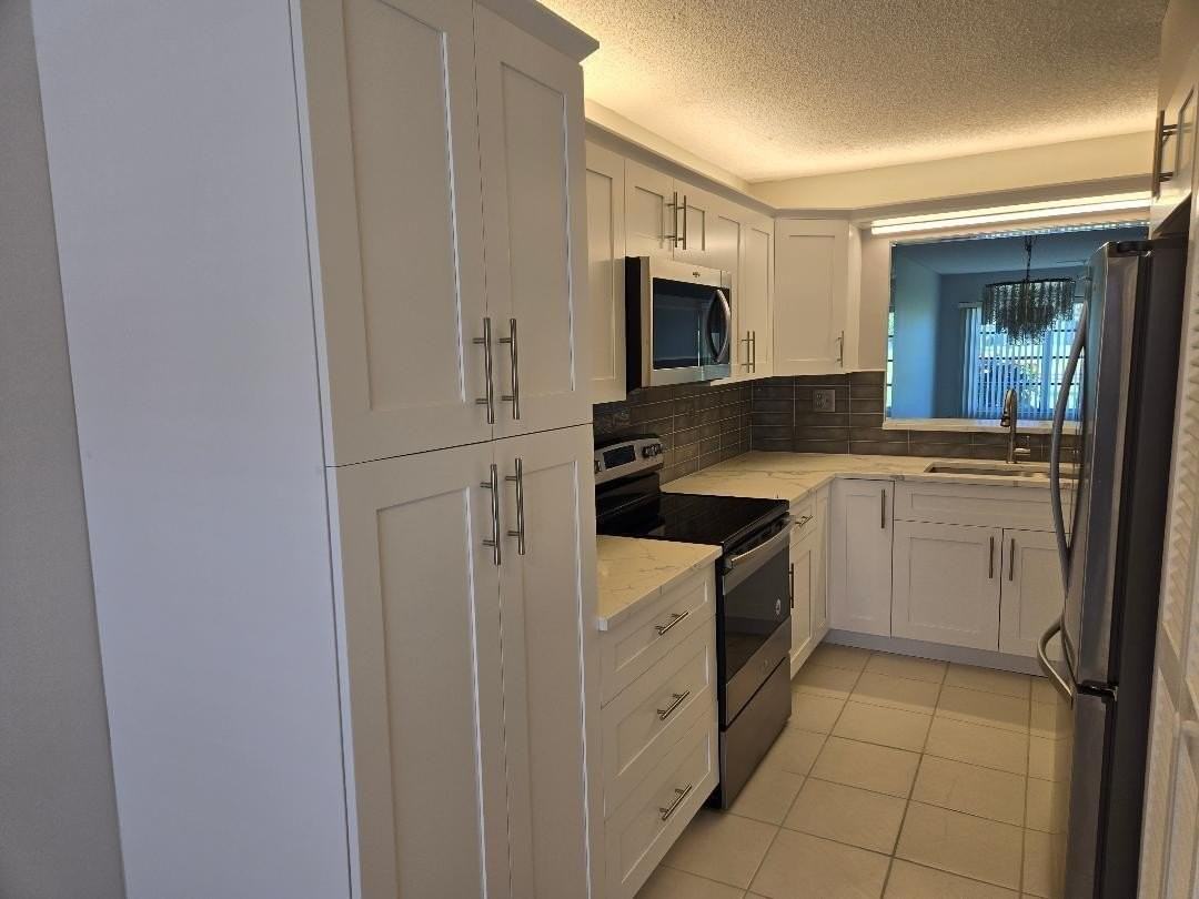5760 Princess Palm Ct #C - Photo 4 of 37