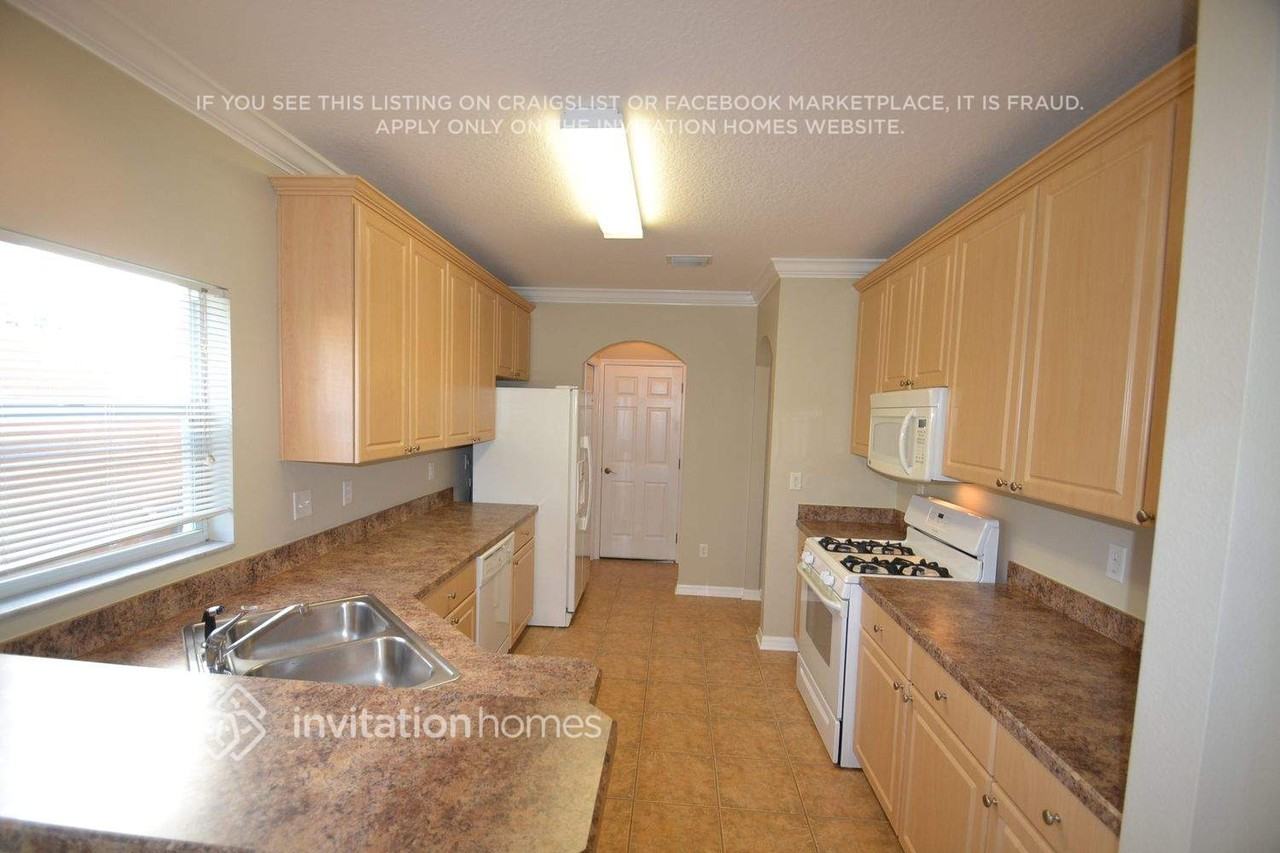 5824 Wrenwater Dr - Photo 3 of 8