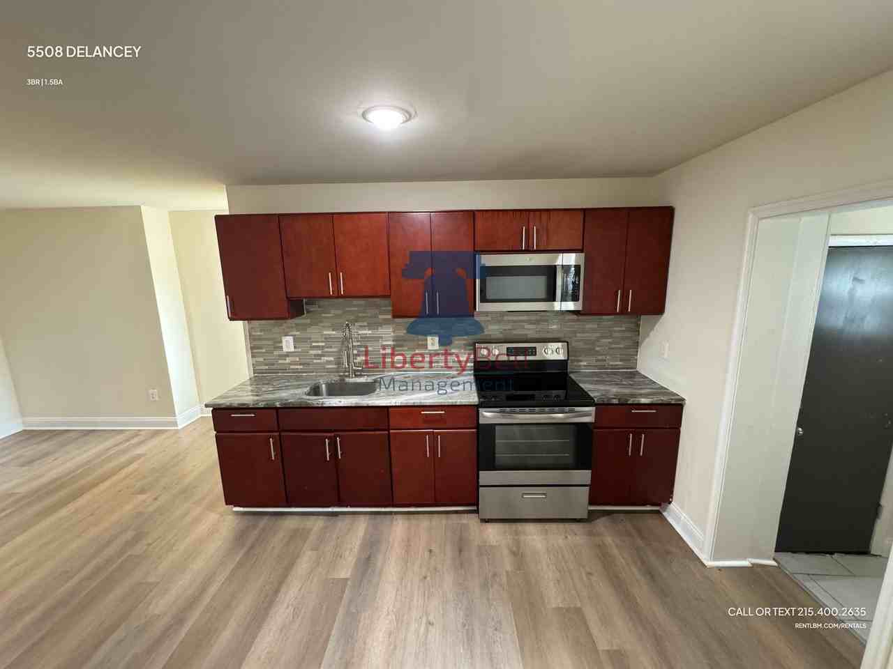 5508 Delancey St - Photo 3 of 13