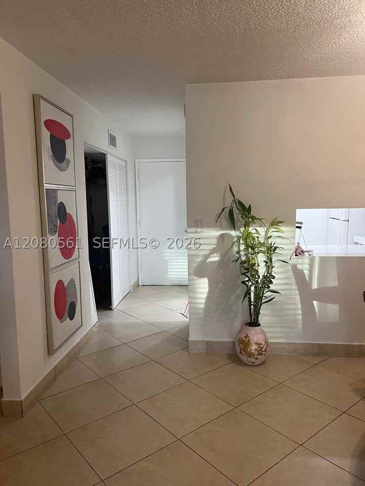 8764 Sw 12th St #105 - Photo 2 of 21