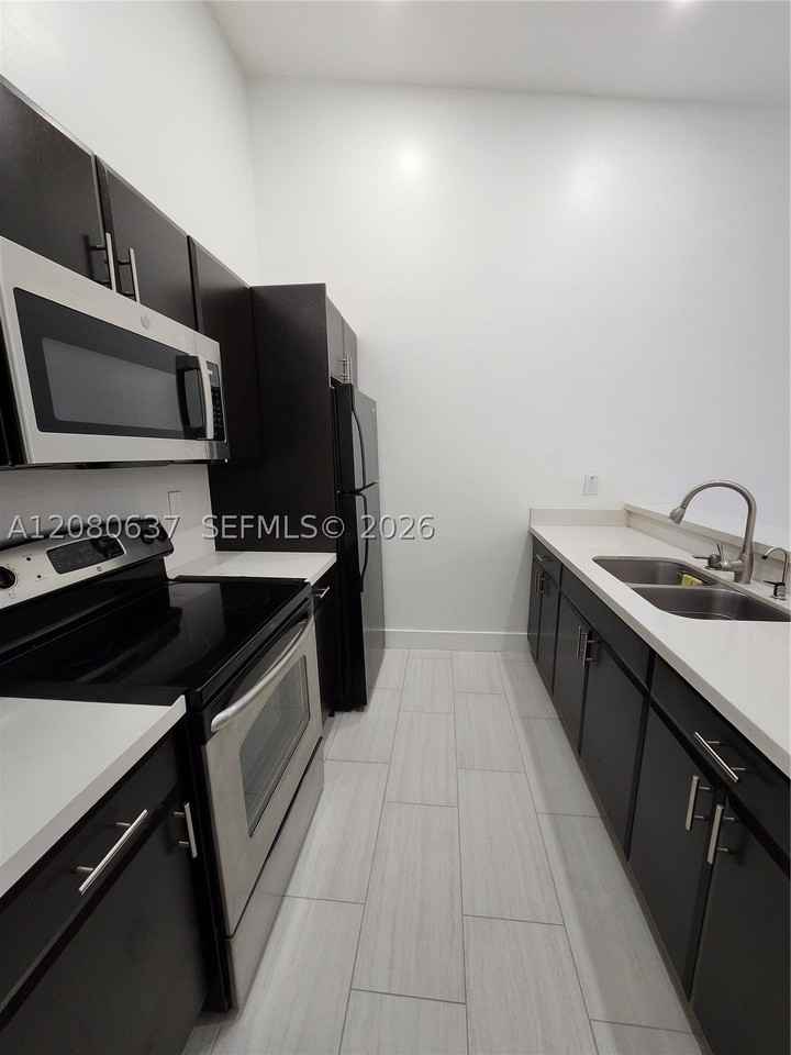 18224 Mediterranean Blvd #8-17 - Photo 5 of 23