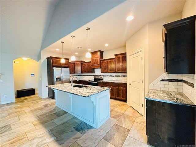 8111 N 75th East Ave - Photo 7 of 48