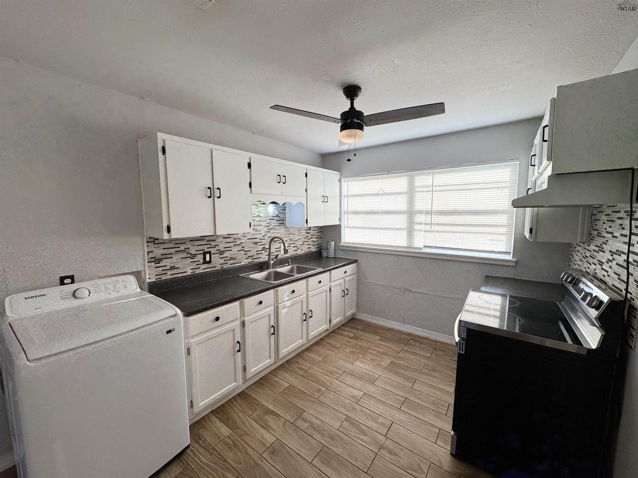 1504 Red Fox Rd - Photo 5 of 17