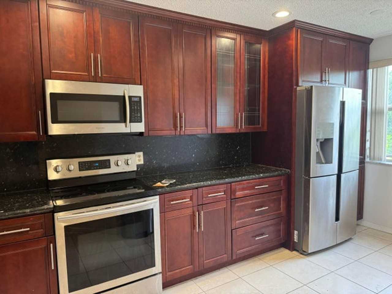 8781 Wiles Rd - Photo 2 of 14