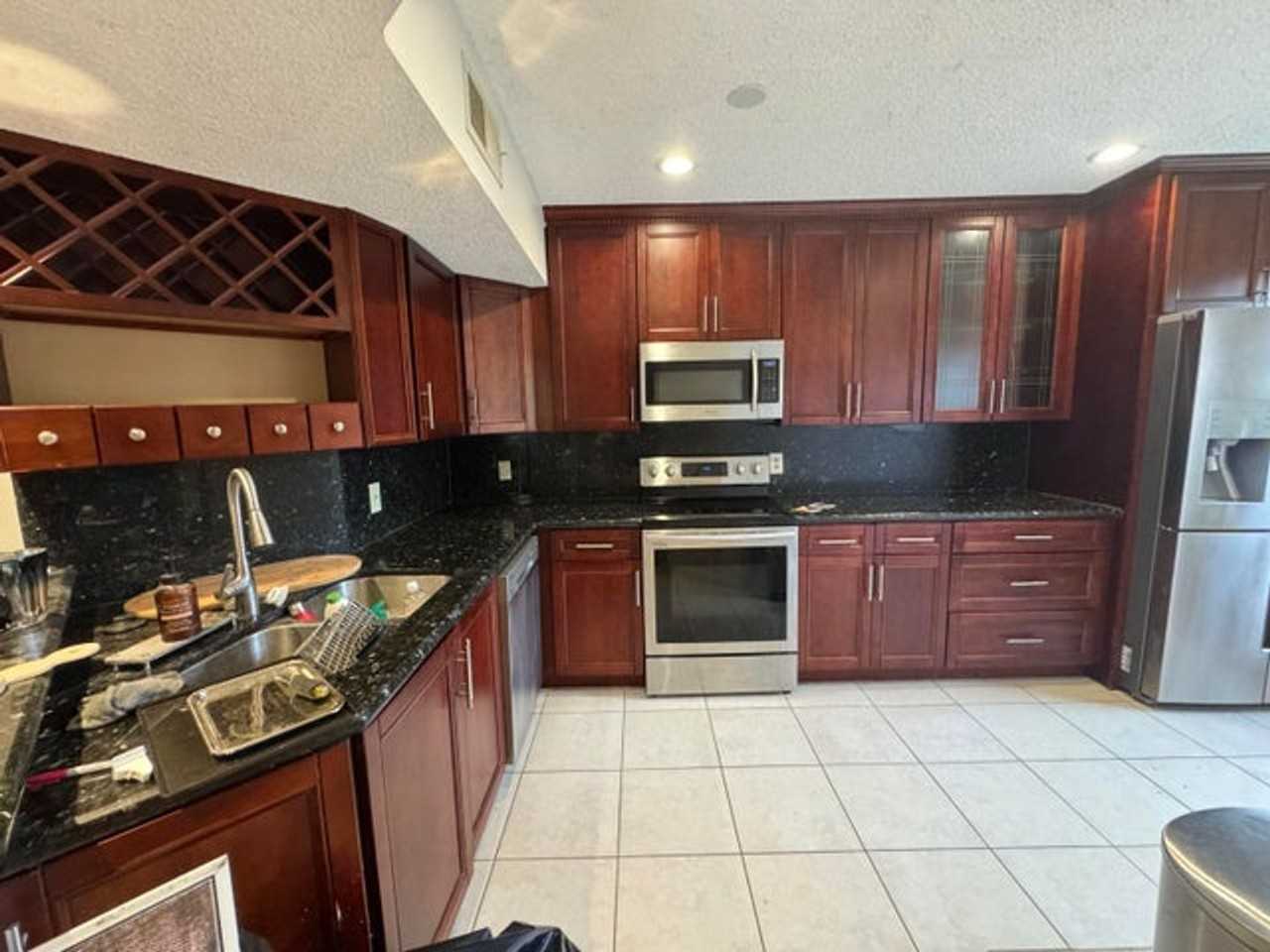 8781 Wiles Rd - Photo 3 of 14