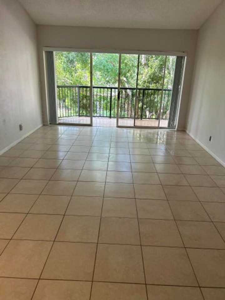 8781 Wiles Rd - Photo 4 of 14