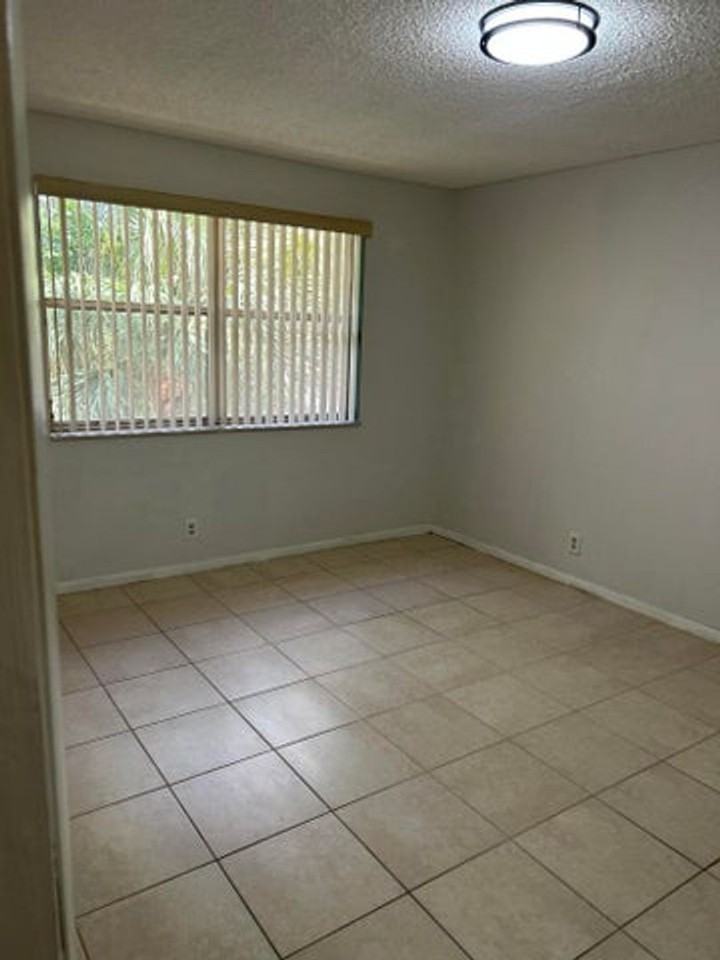 8781 Wiles Rd - Photo 7 of 14
