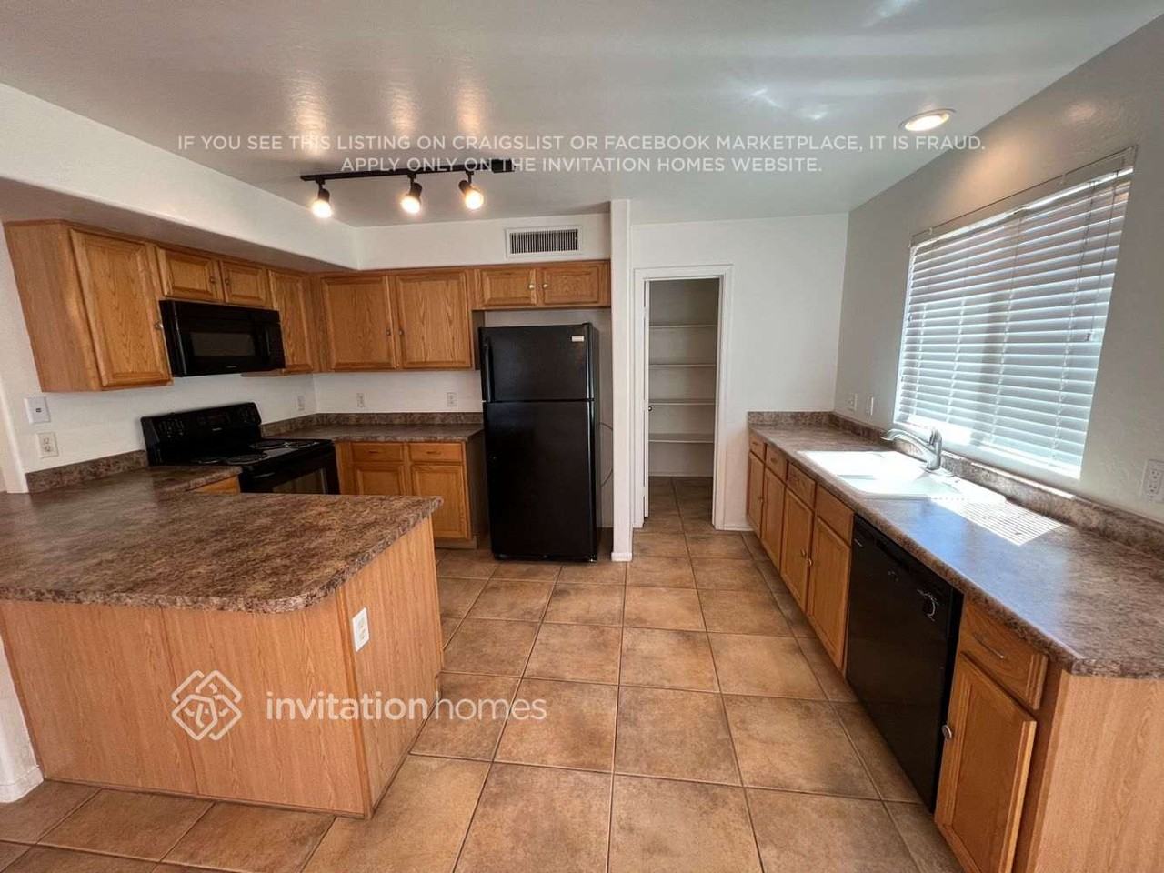 1418 S 122nd Ln - Photo 5 of 14