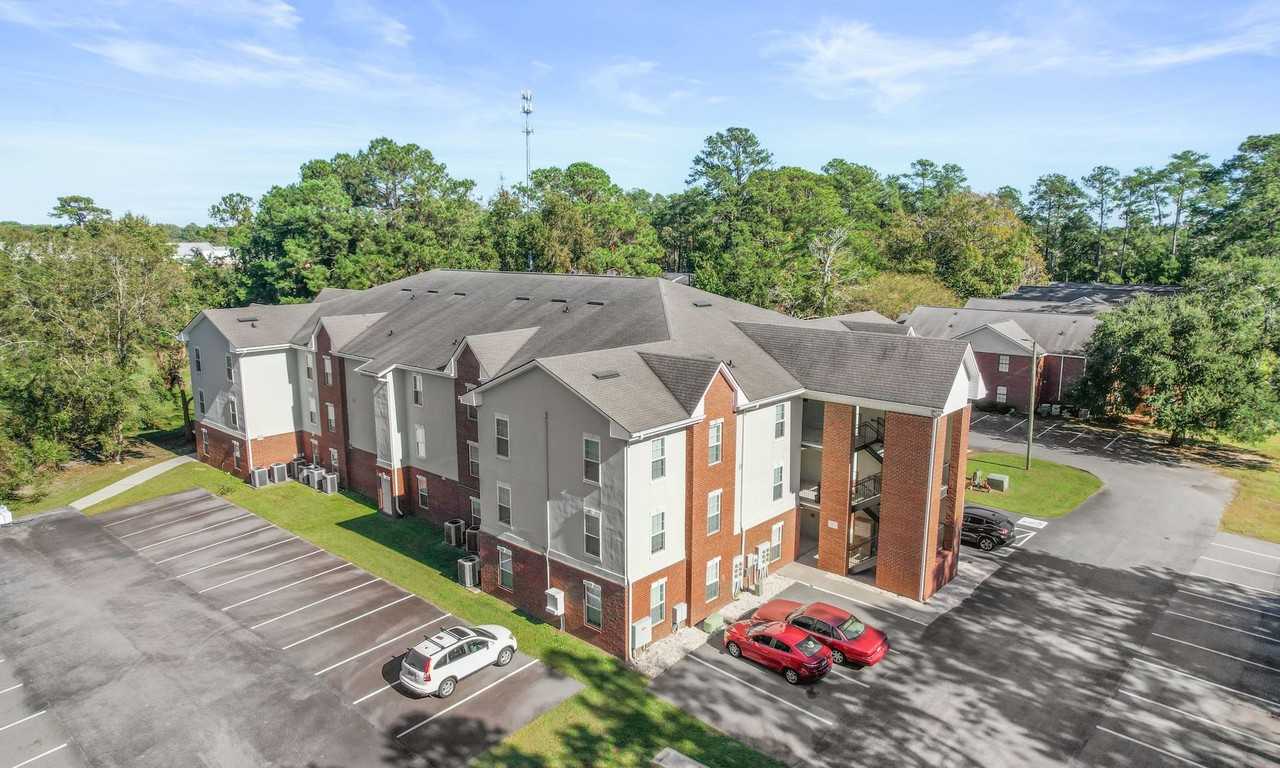 Apache Apartments — 2 & 4 Bedroom Homes on Savannah's Southside - Photo 2 of 36