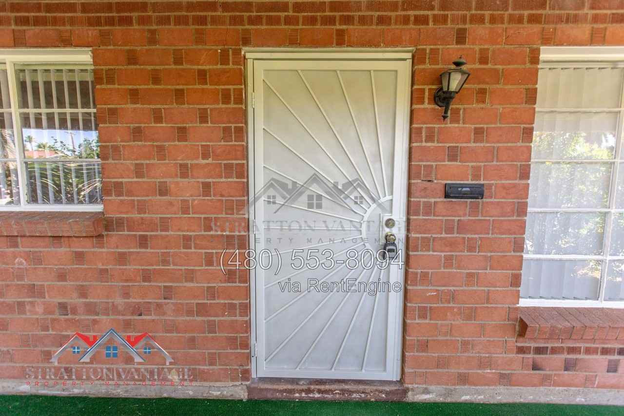 8119 E Amelia Ave - Photo 6 of 50