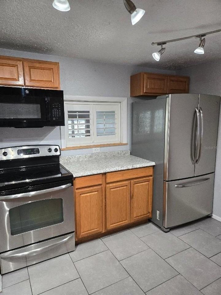 11829 71st St E - Photo 7 of 25