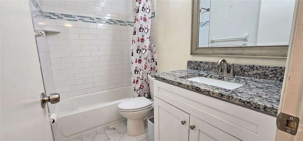 1712 Belleair Forest Dr #A - Photo 6 of 16