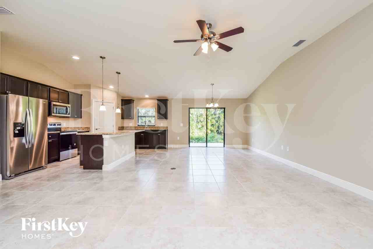 9023 Caloosa Rd - Photo 3 of 15