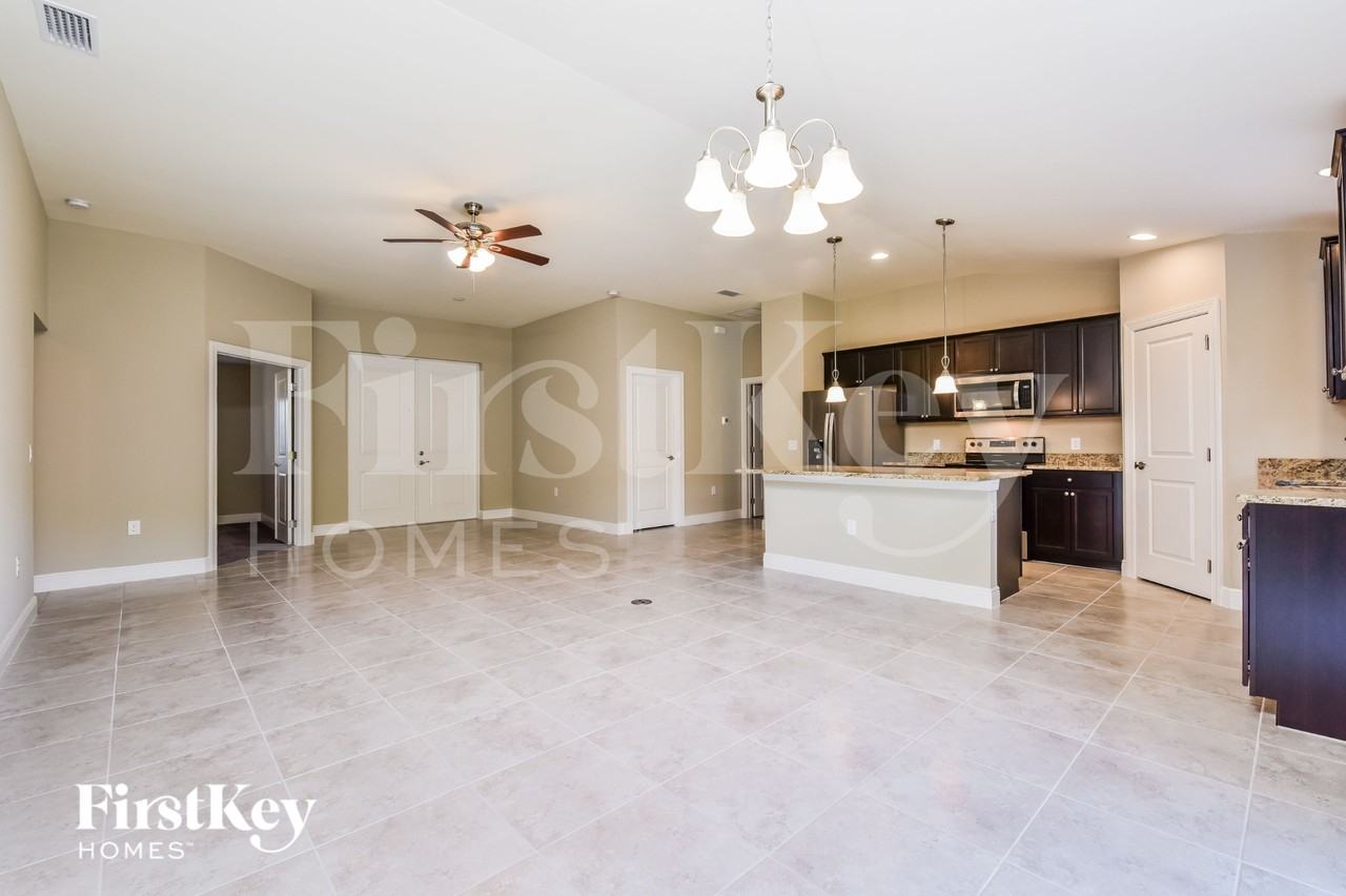 9023 Caloosa Rd - Photo 5 of 15