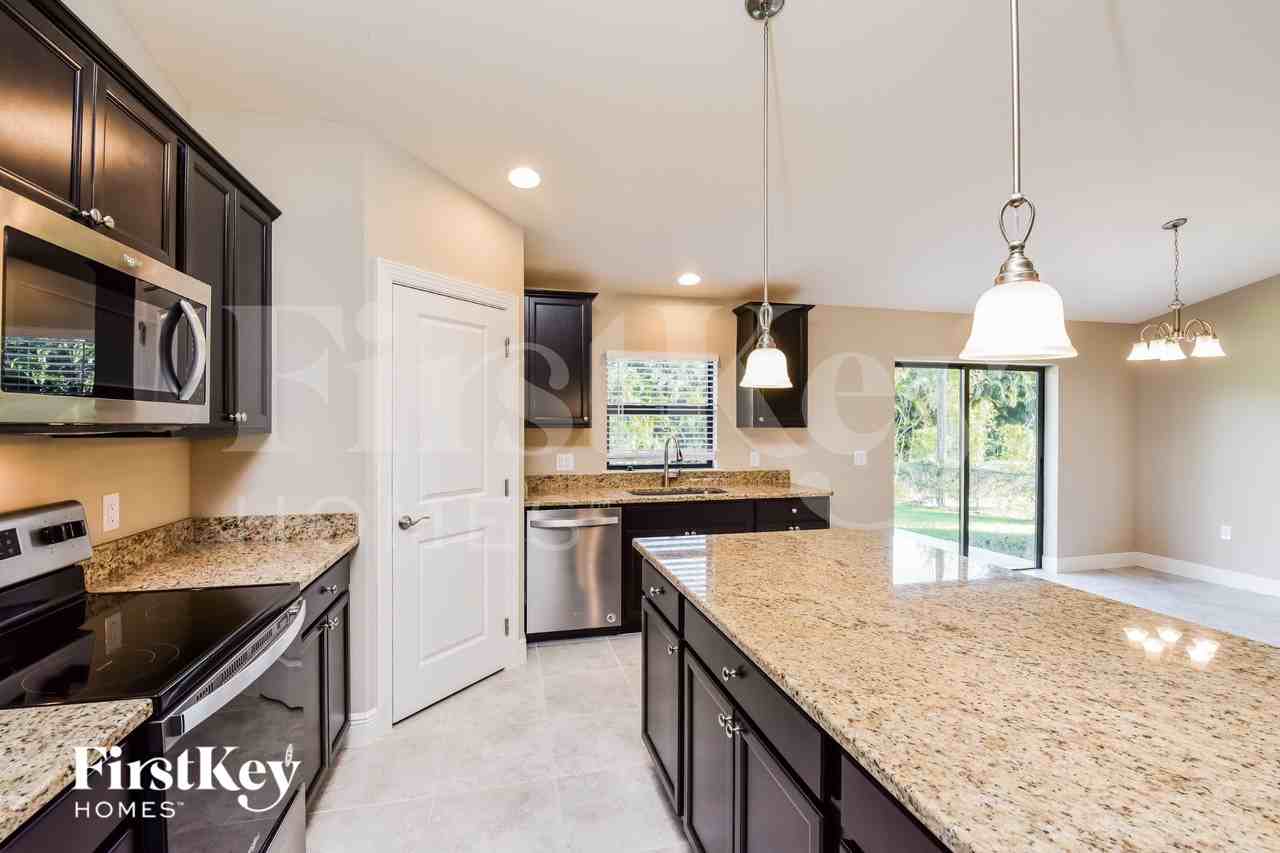 9023 Caloosa Rd - Photo 7 of 15