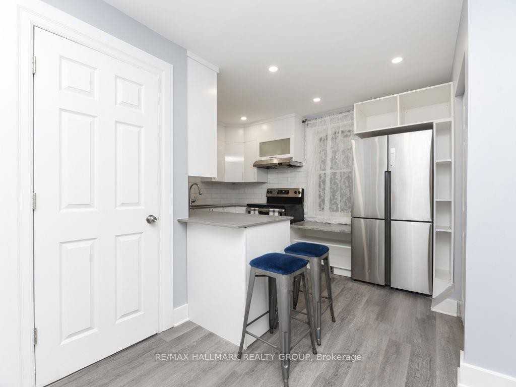 2 + 2 Bedroom Academic Suite • Main Floor + Basement • All Inclusive • Sandy Hill - Photo 4 of 23
