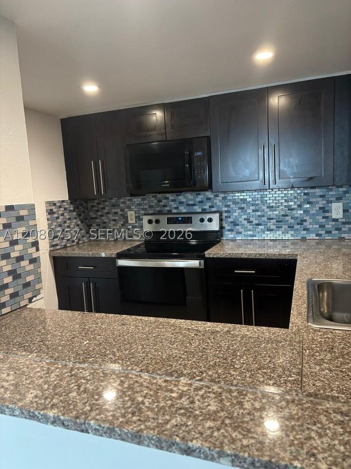 6970 Nw 186th St #3-505 - Photo 4 of 10