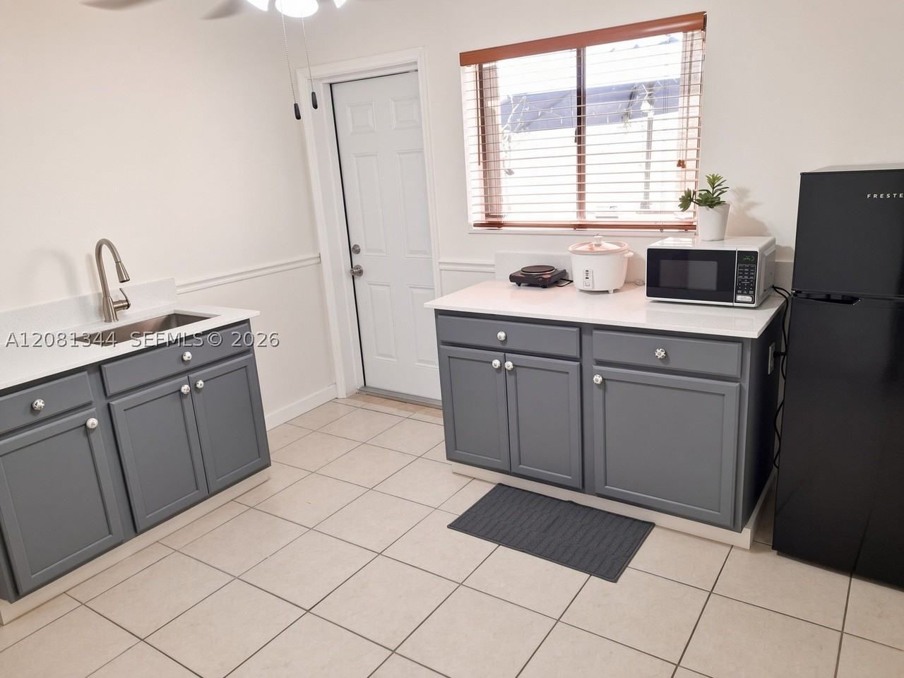 10329 Nw 128th Ter #1 - Photo 2 of 5