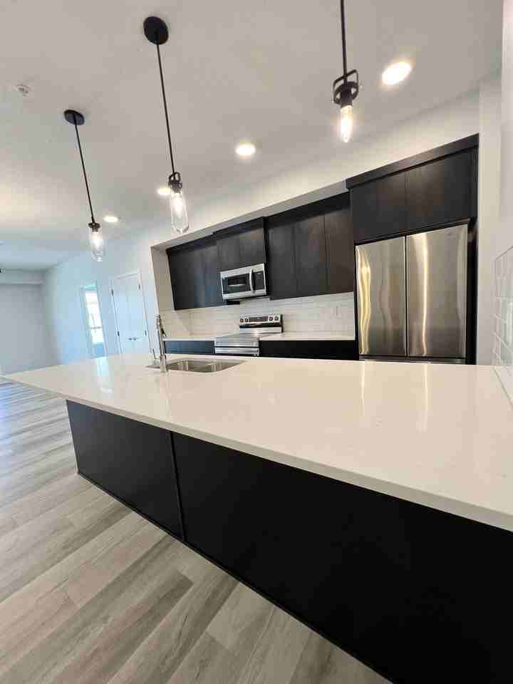 Riverstone Manor - Photo 3 of 15