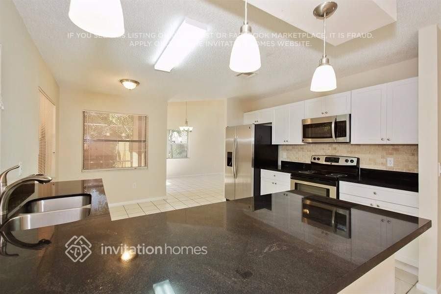 6998 Dearborn Pl - Photo 6 of 17