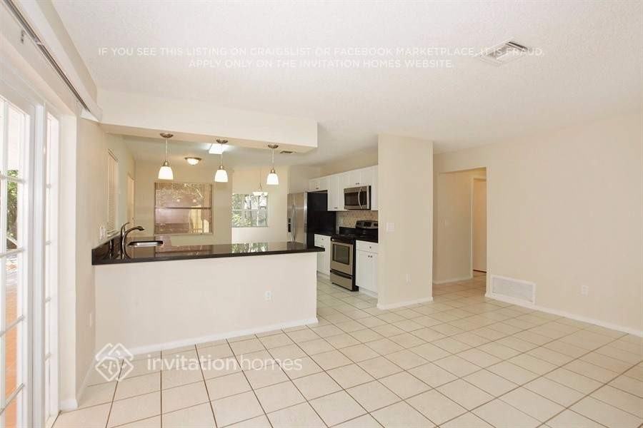 6998 Dearborn Pl - Photo 7 of 17