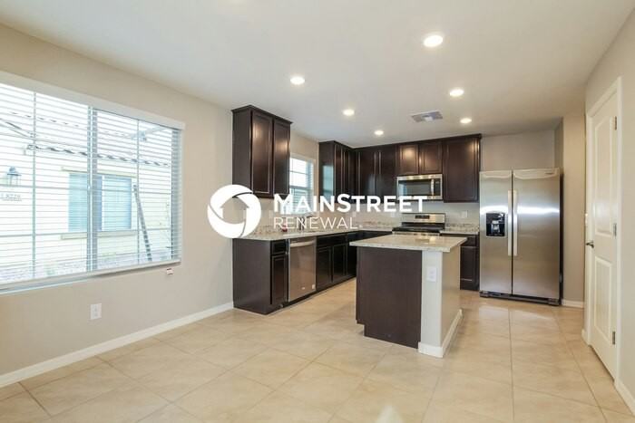 8237 W Albeniz Pl - Photo 5 of 17