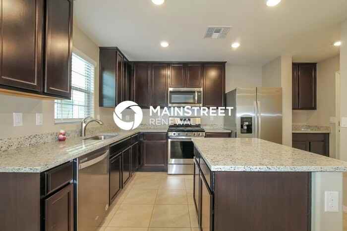 8237 W Albeniz Pl - Photo 6 of 17