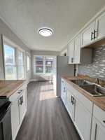 featured image of 1008 1/2 Rhomberg Ave #1-2