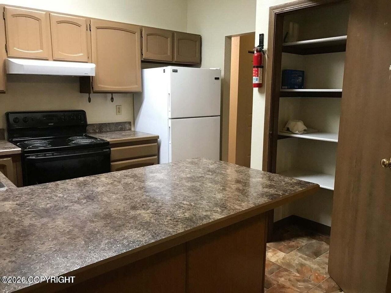 6121 E 41st Ct #3 - Photo 2 of 10
