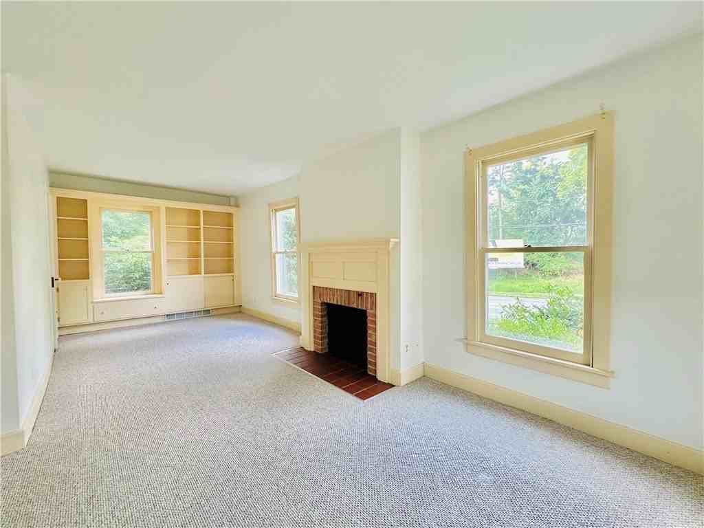 1253 Fairport Rd - Photo 6 of 31