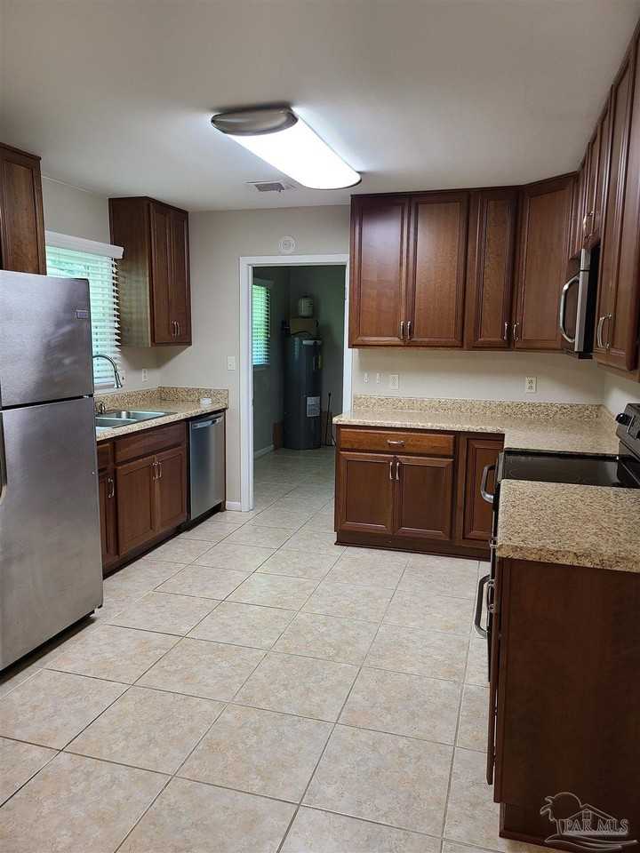 5560 Hibiscus Rd - Photo 5 of 22