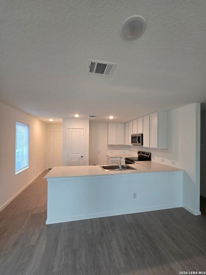 8027 Biggio Ln - Photo 3 of 17