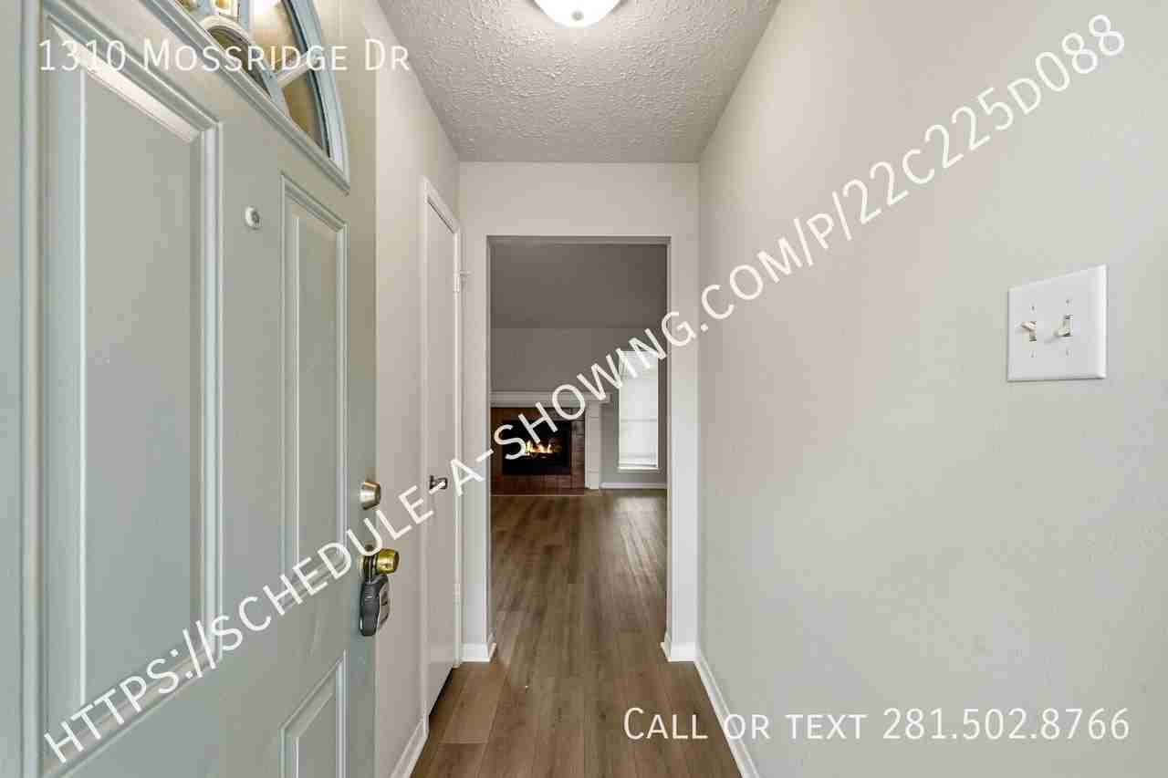 1310 Mossridge Dr - Photo 2 of 13