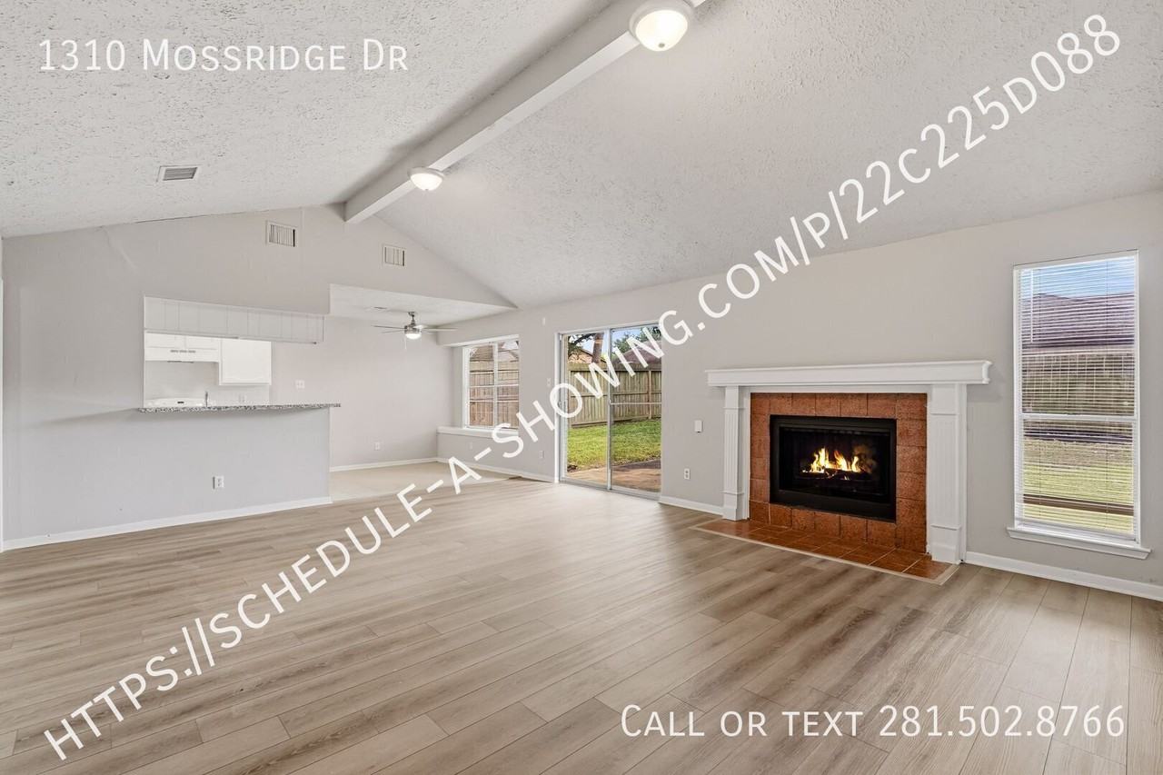 1310 Mossridge Dr - Photo 3 of 13