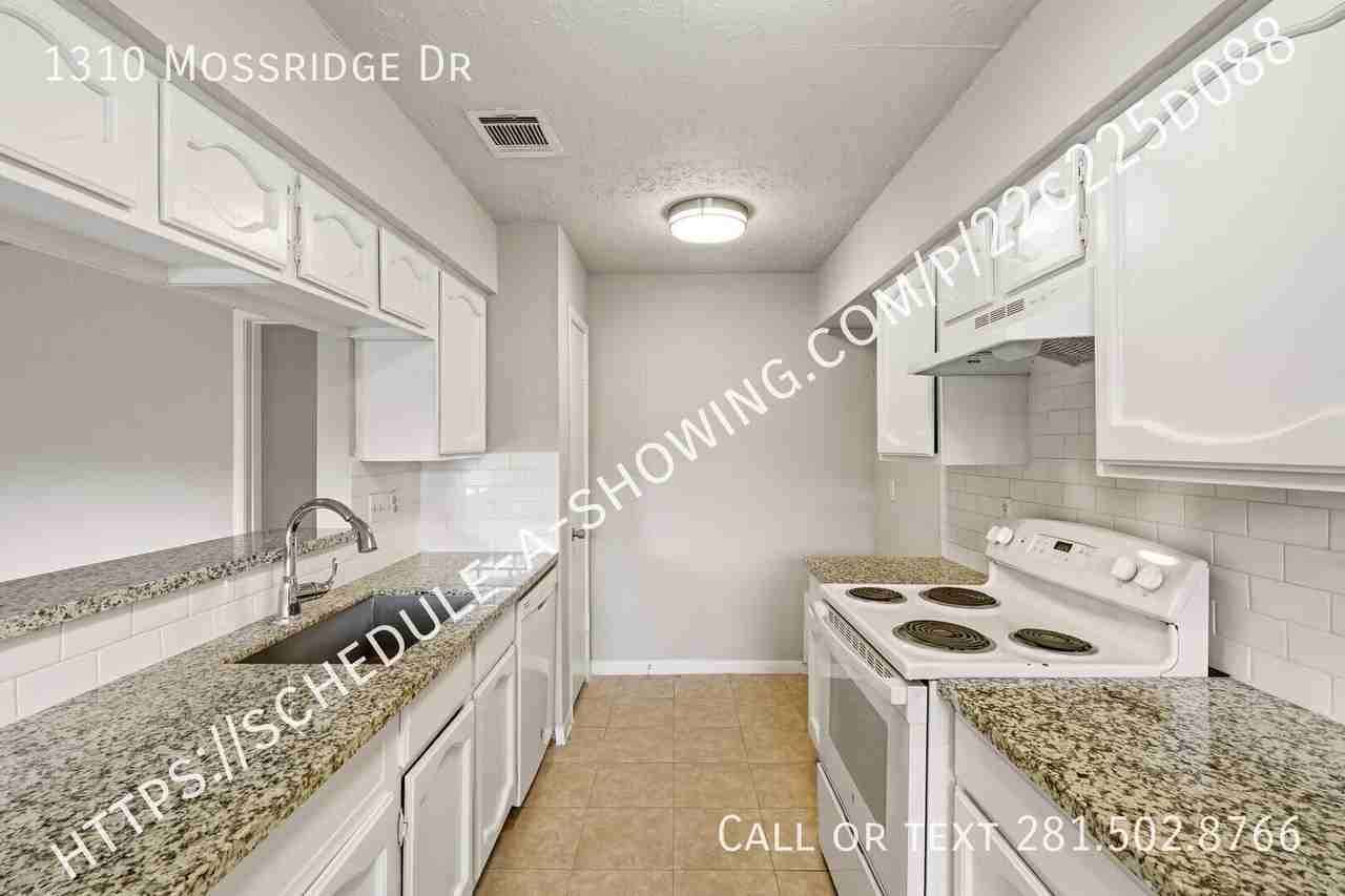 1310 Mossridge Dr - Photo 6 of 13