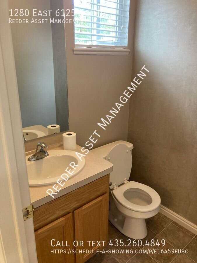 1280 E 6125 S - Photo 4 of 7