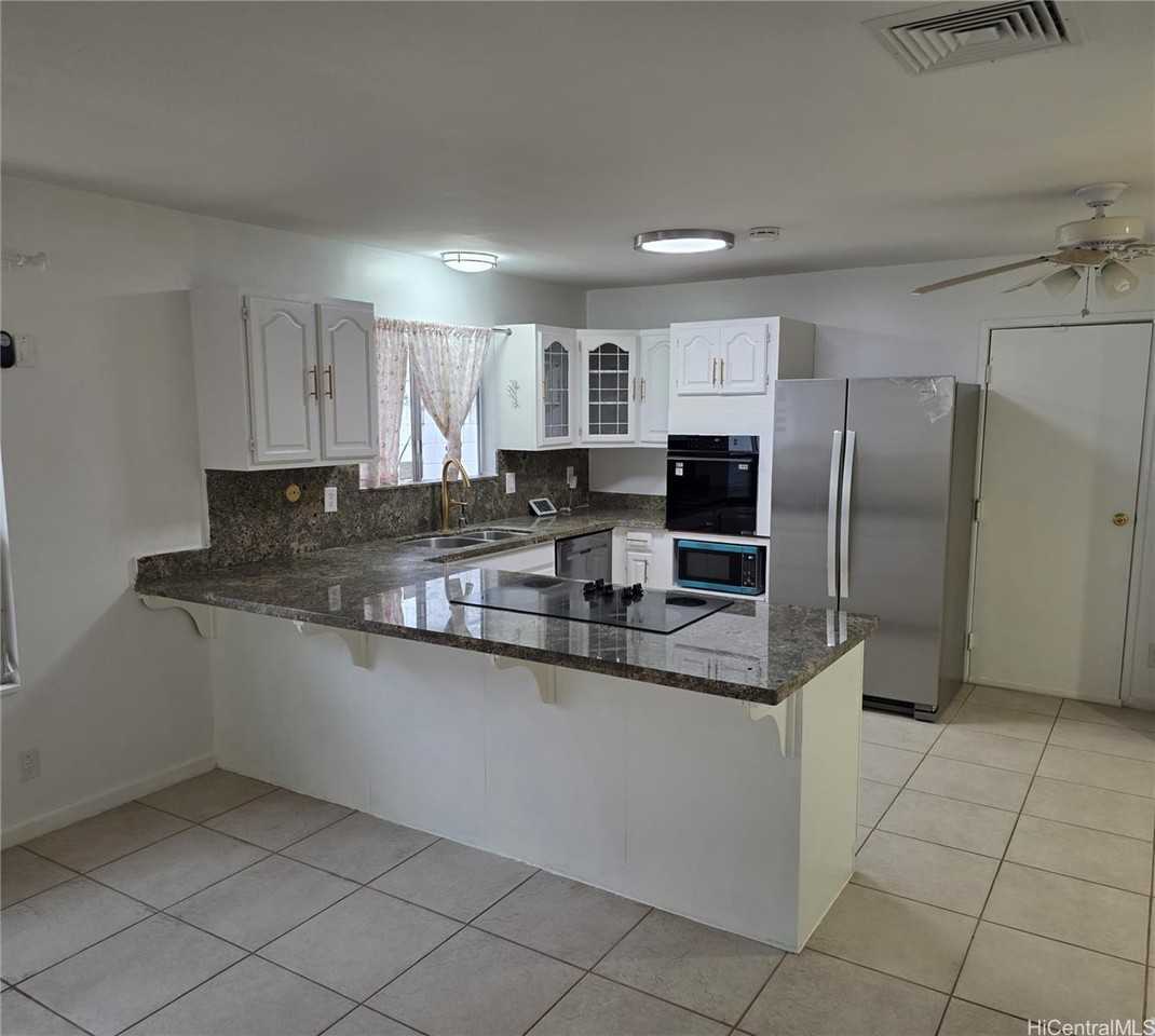 1444 Kina St - Photo 4 of 9