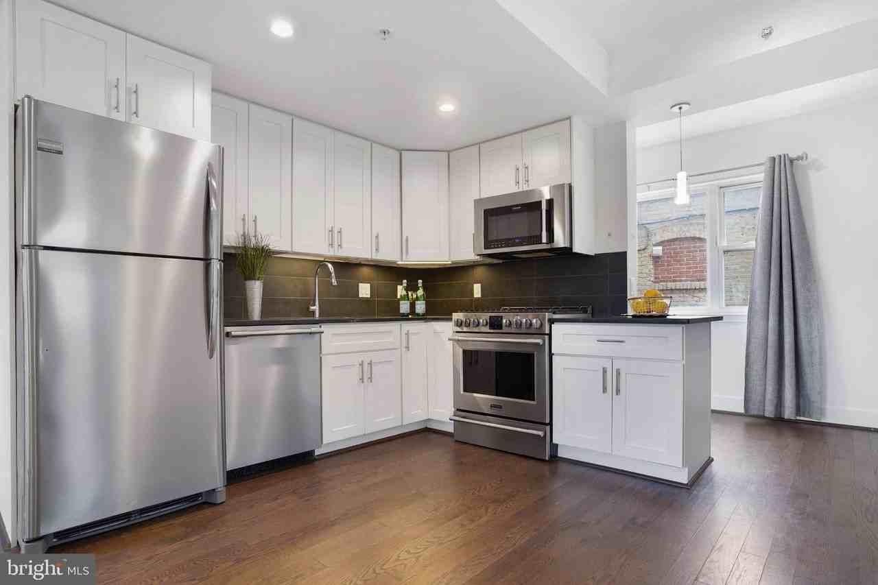 7723 Alaska Ave Nw #103 - Photo 3 of 14
